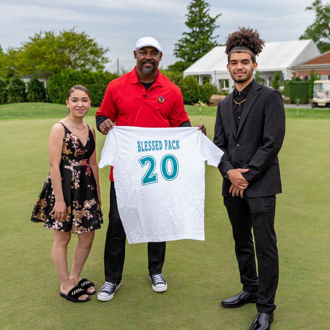 Brian Dawkins with GWHS students on course